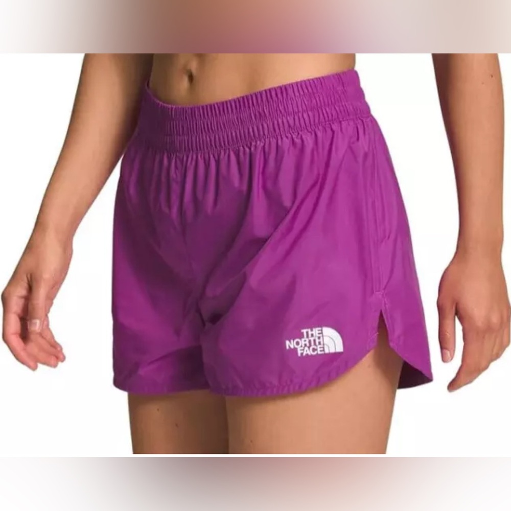 Women’s The North Face NEW purple running shorts back zipper pocket size Large
